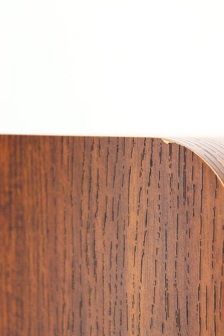Close up of a used Q Acoustics 3050i Floorstanding Speakers in a walnut finish showing chip on rear edge