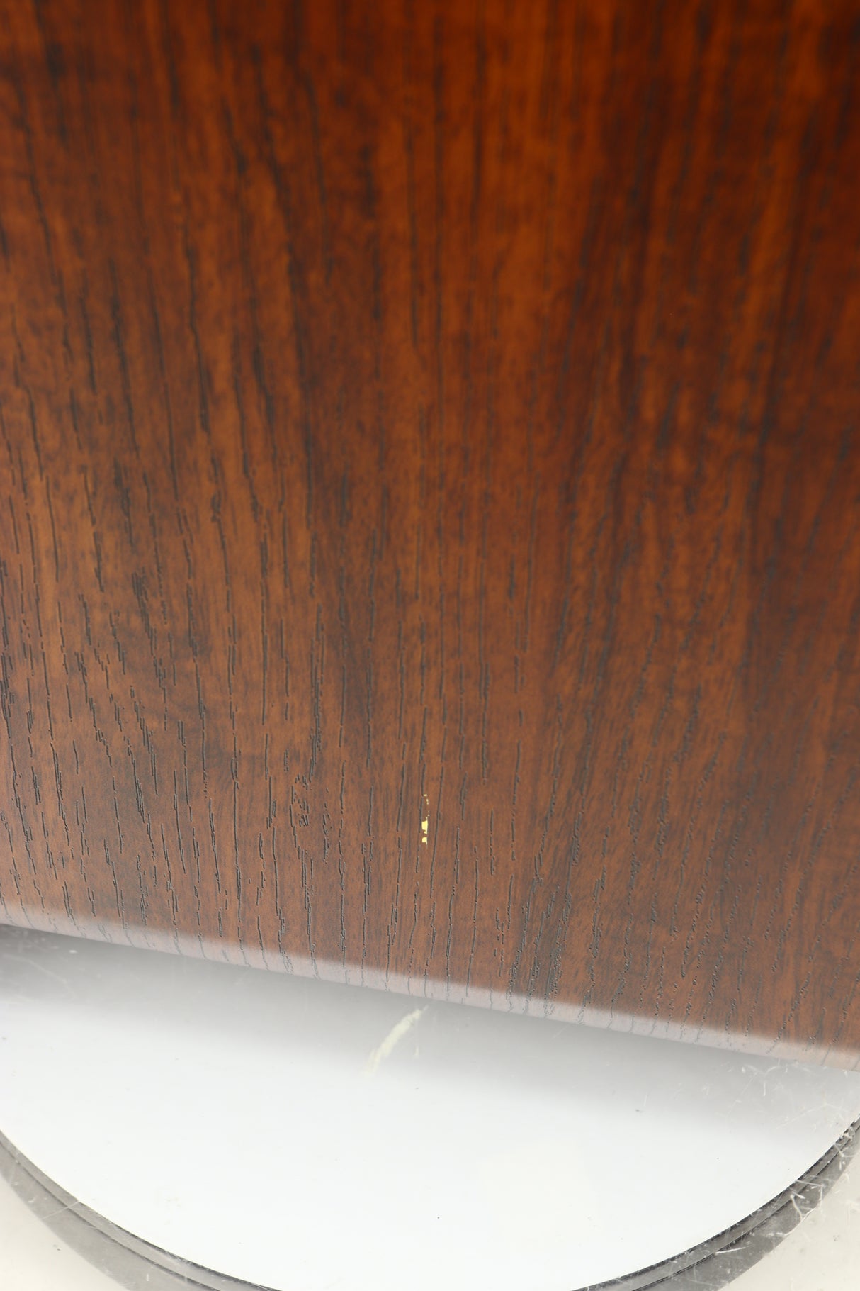 Close up of a used Q Acoustics 3050i Floorstanding Speakers in a walnut finish showing small chipping on left side