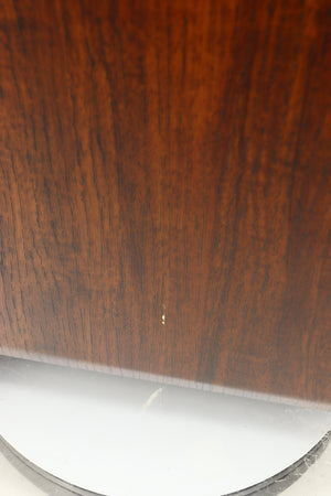 Close up of a used Q Acoustics 3050i Floorstanding Speakers in a walnut finish showing small chipping on left side