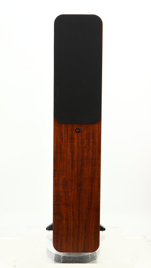 Front view of a used Q Acoustics 3050i Floorstanding Speakers in a walnut finish showing Grille