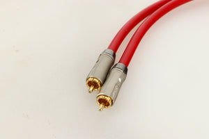 Close up view of a used pair of QED Reference Audio 1 RCA Interconnect 0.5m 