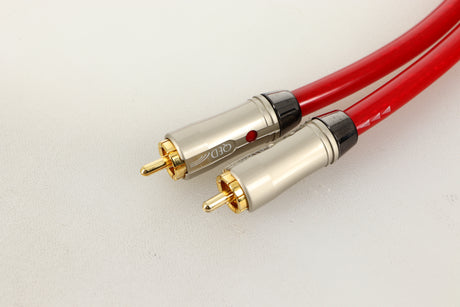 Close up view of a used pair of QED Reference Audio 1 RCA Interconnect 0.5m 