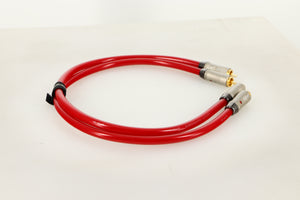 Side view of a used pair of QED Reference Audio 1 RCA Interconnect 0.5m 