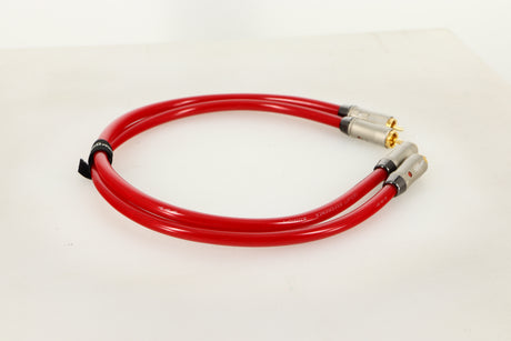 Side view of a used pair of QED Reference Audio 1 RCA Interconnect 0.5m 