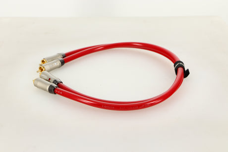Side view of a used pair of QED Reference Audio 1 RCA Interconnect 0.5m 