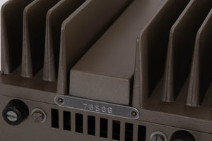 Close up of a used Quad 303 Power Amplifier showing serial number