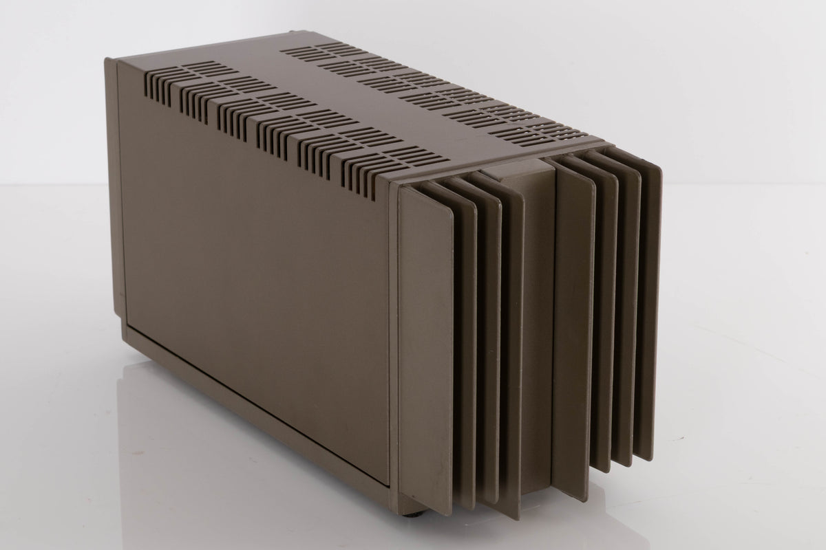 Front left corner of a used Quad 303 Power Amplifier