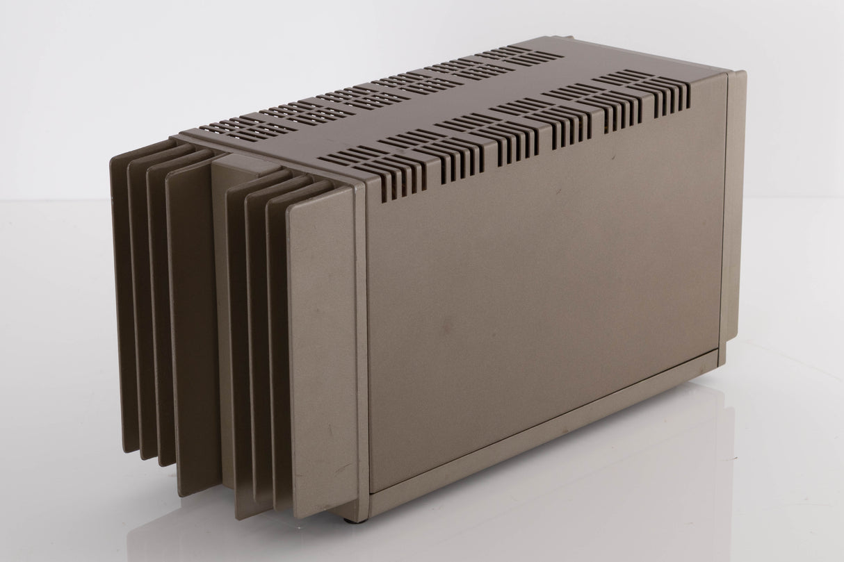 Front right corner of a used Quad 303 Power Amplifier