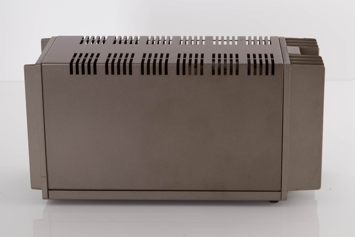 Left side view of a used Quad 303 Power Amplifier