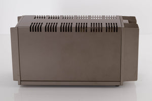 Left side view of a used Quad 303 Power Amplifier