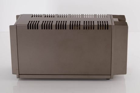 Left side view of a used Quad 303 Power Amplifier