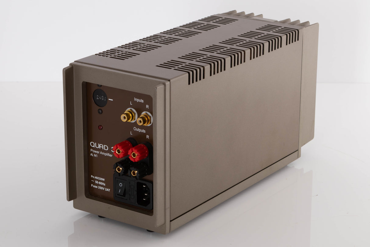 Rear left corner of a used Quad 303 Power Amplifier
