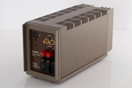 Rear left corner of a used Quad 303 Power Amplifier