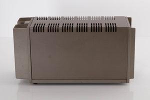 Right side view of a used Quad 303 Power Amplifier