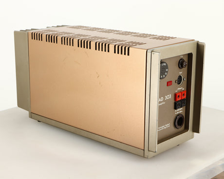 Rear right corner of a used Quad 303 Power Amplifier