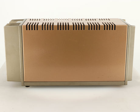 Right side view of a used Quad 303 Power Amplifier