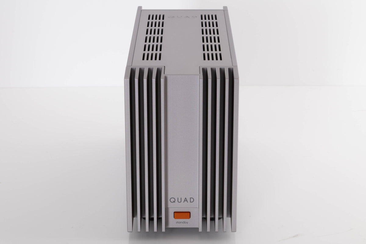 Front view of a used Quad 303 Power Amplifier in a Silver finish