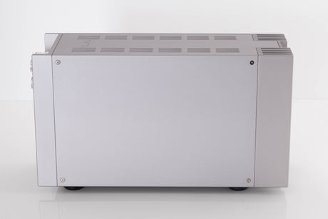 Left side view of a used Quad 303 Power Amplifier in a Silver finish