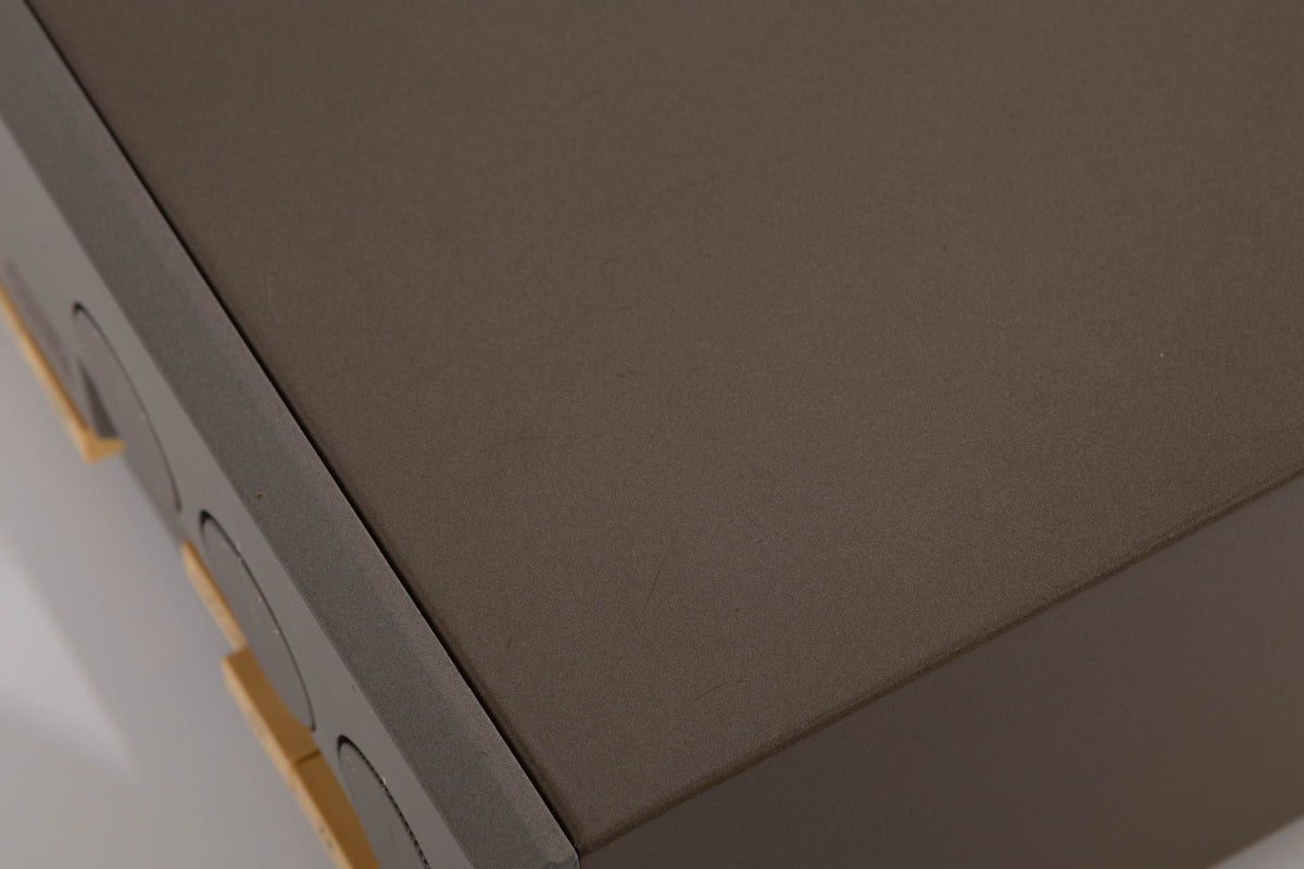 Close up of a used Quad 33 Pre Amplifier (Modified) showing scratches on top