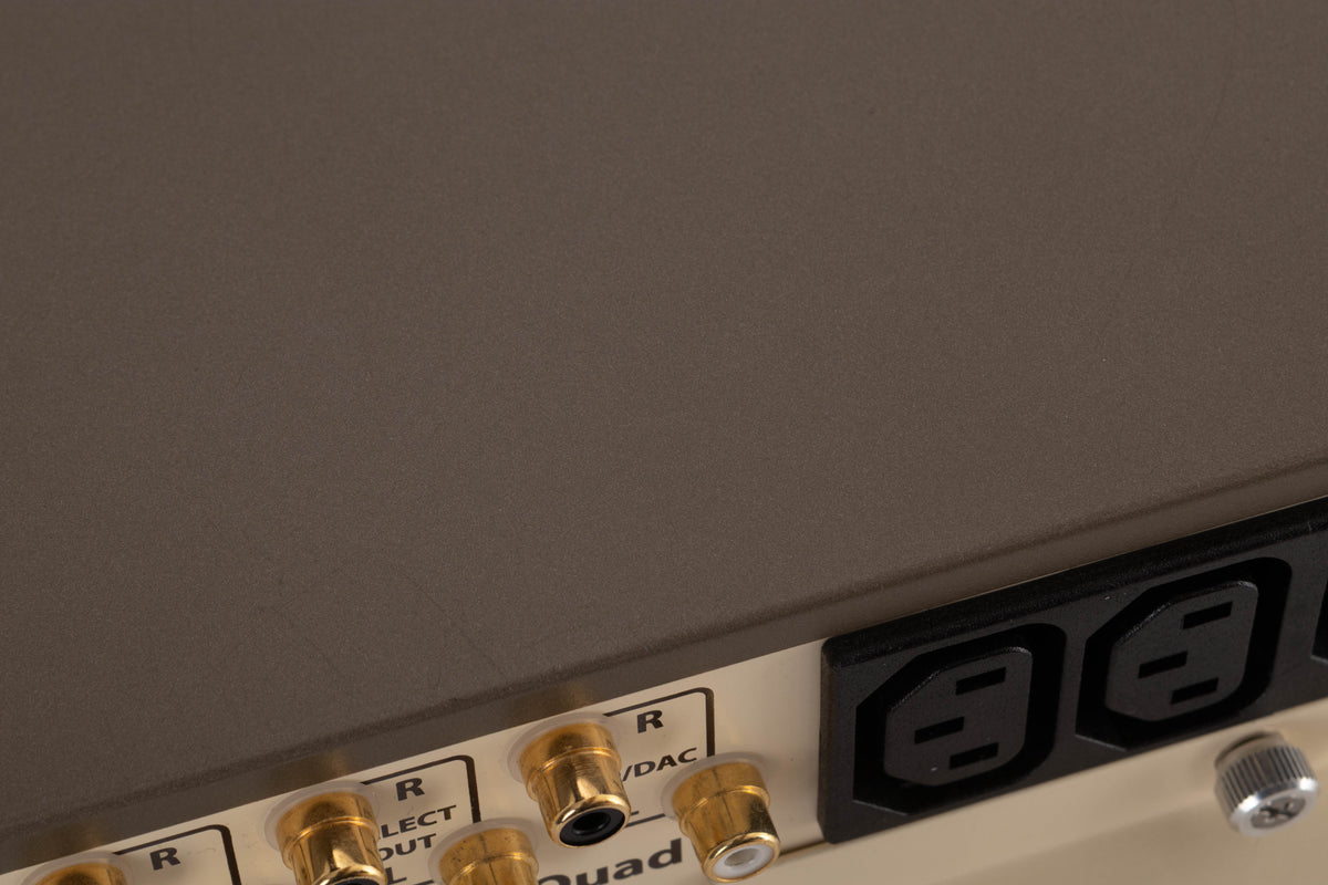 Close up of a used Quad 33 Pre Amplifier (Modified) showing scratches on top