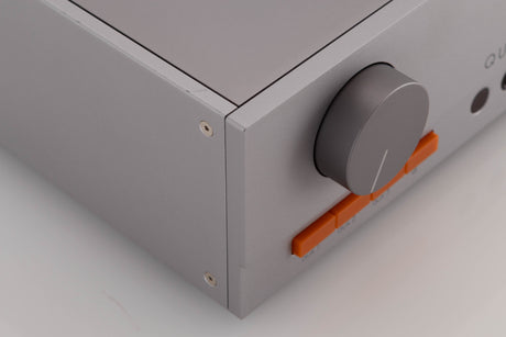 Front left corner of a used Quad 33 Pre Amplifier in a Silver finish