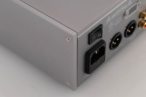 Rear right corner of a used Quad 33 Pre Amplifier in a Silver finish