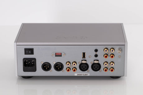 Rear view of a used Quad 33 Pre Amplifier in a Silver finish showing Mains Cable, Analogue Inputs, Phono Inputs and XLR Inputs