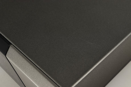 Close up of a used Quad 67 CD Player showing some scratches on top