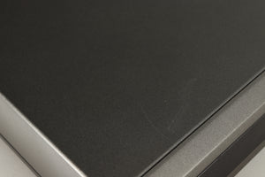 Close up of a used Quad 67 CD Player showing some scratches on top