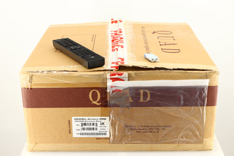 Box for a used Quad Artera Pre Amplifier in a black finish showing Remote and 2x Batteries