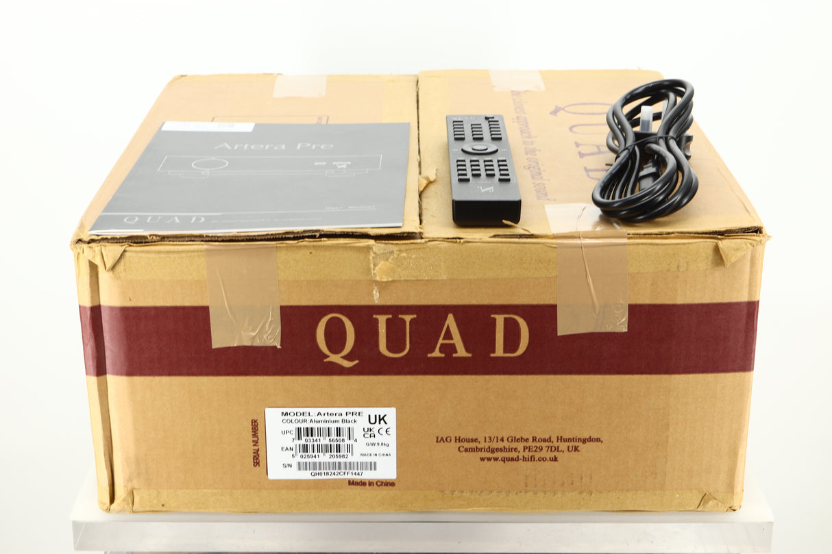 Box of Quad Artera Pre Amplifier showing manual, remote, and mains cable