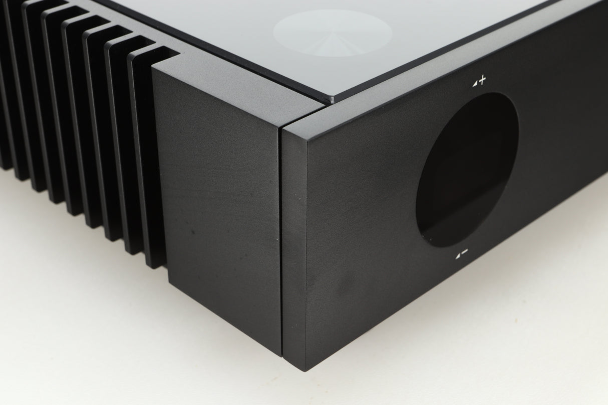Close up of a used Quad Artera Pre Amplifier front left corner in black finish