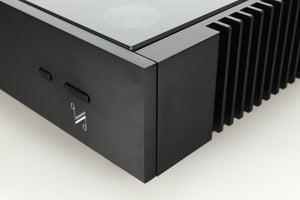 Close up of a used Quad Artera Pre Amplifier front right corner in black finish