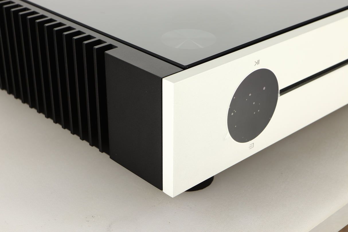 Front left corner view of a used Quad Artera Solus Integrated System in Silver finish