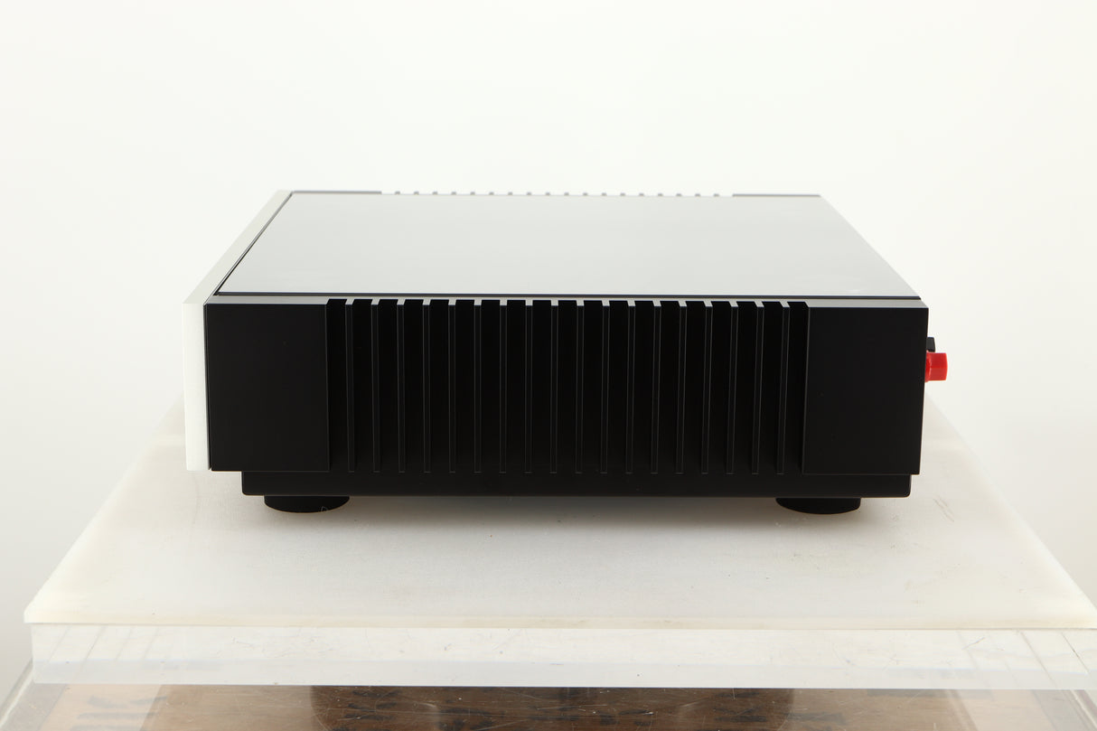 Side view of a used Quad Artera Solus Integrated System in Silver finish