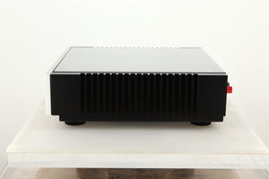 Side view of a used Quad Artera Solus Integrated System in Silver finish