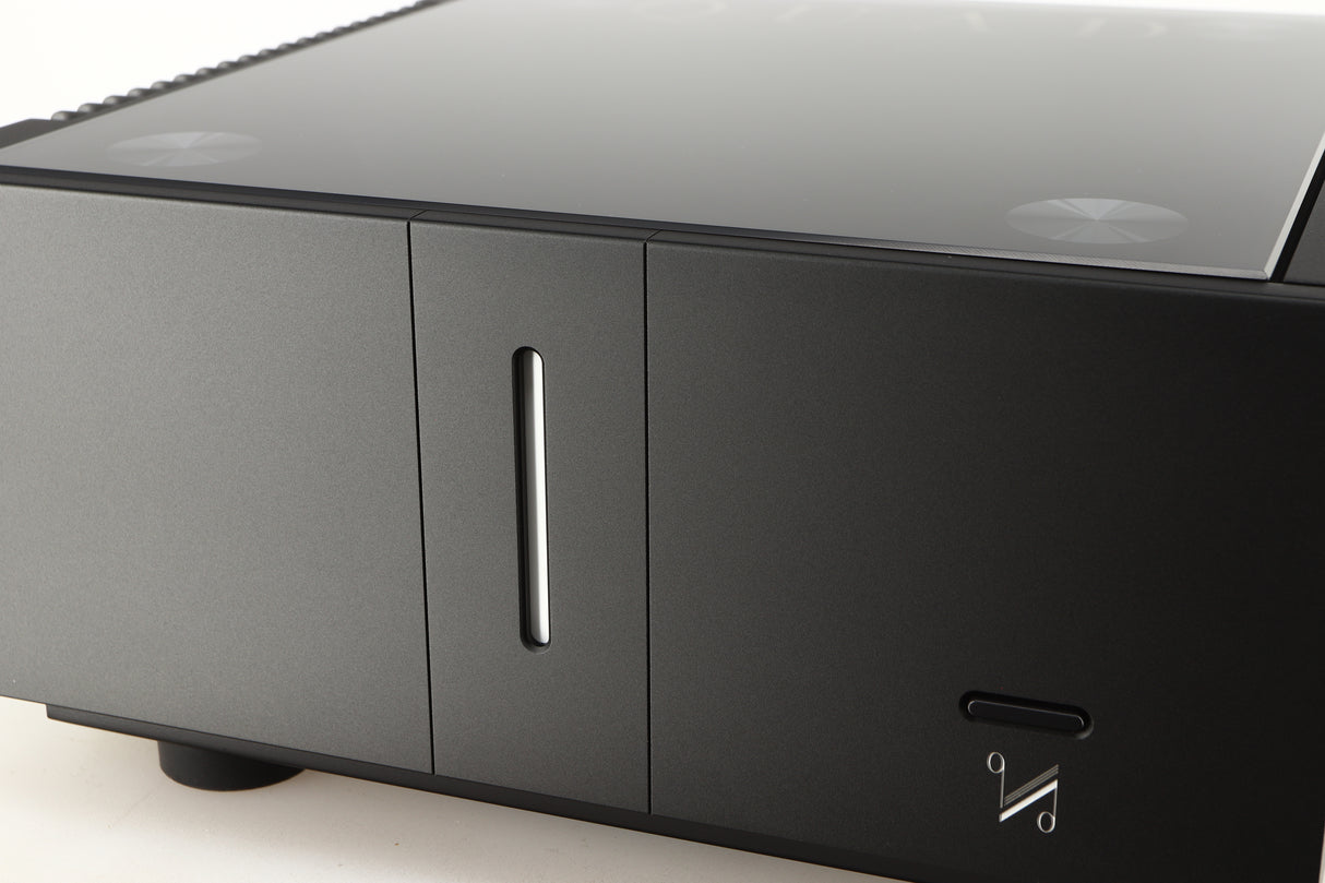 Close up of a used Quad Artera Stereo Power Amplifier in a black finish showing some of the fascia