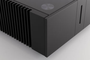 Front left corner of a used Quad Artera Stereo Power Amplifier in a Black finish