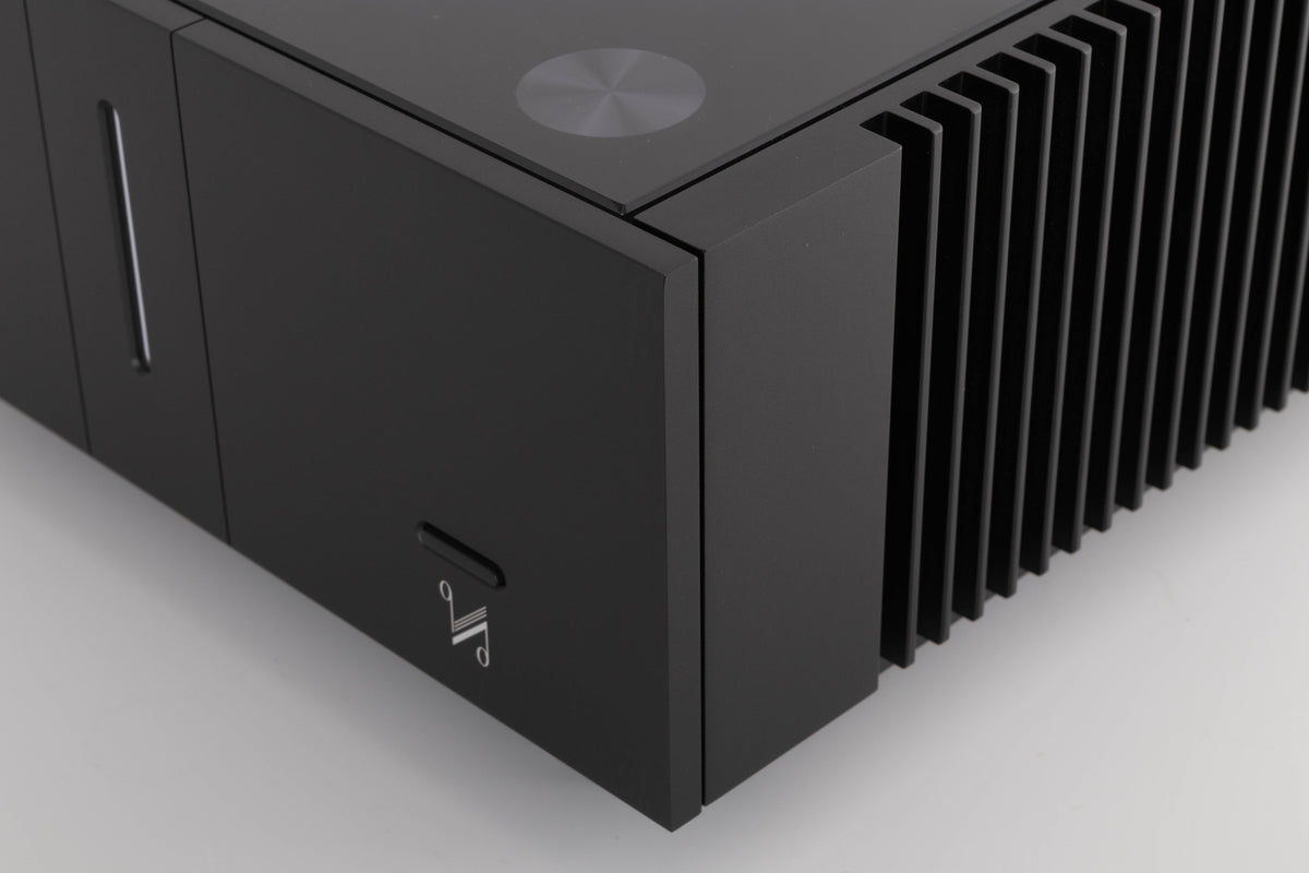 Front right corner of a used Quad Artera Stereo Power Amplifier in a Black finish
