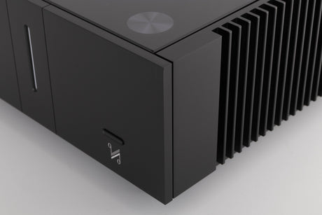 Front right corner of a used Quad Artera Stereo Power Amplifier in a Black finish