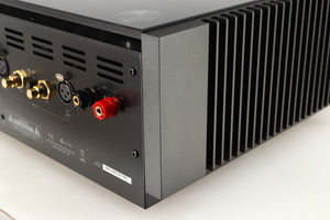 Rear left corner of a used Quad Artera Stereo Power Amplifier in a black finish