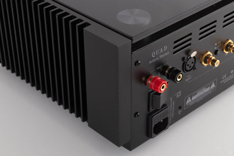 Rear right corner of a used Quad Artera Stereo Power Amplifier in a Black finish
