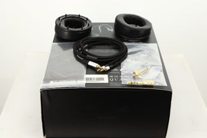 Box for used Quad ERA-1 Headphones showing 2x Ear Muffs, Manual, 2x Adaptors and Headphone Cable