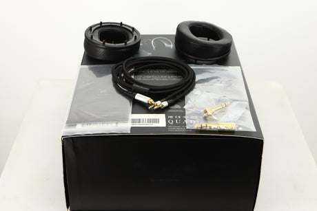 Box for used Quad ERA-1 Headphones showing 2x Ear Muffs, Manual, 2x Adaptors and Headphone Cable