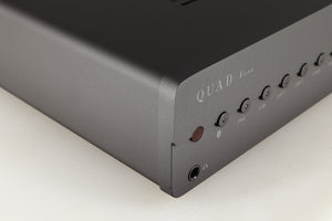 Front left corner of a used Quad Vena Integrated Amplifier in a lancaster grey finish
