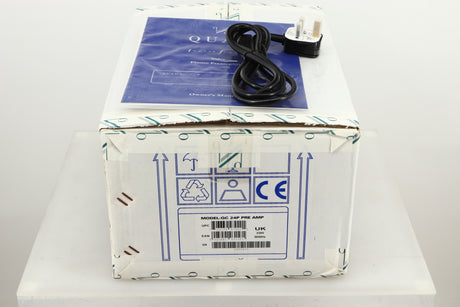 Box of a used Quad QC Twenty Four P Phonostage showing manual, and mains cable