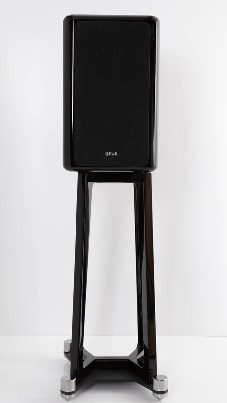 Front view of a used Quad Revela 1 Standmount Speakers W/ Stands in a Walnut finish showing Grille