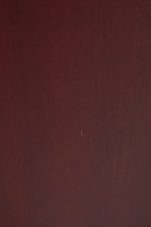 Close up of a used Quad S-4 Floorstanding Speaker in a Sapele Mahogany finish showing small dink in cabinet