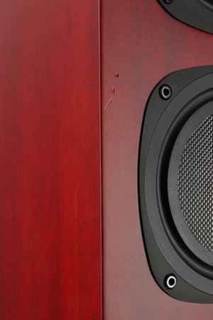 Close up of a used Quad S4 Floorstanding Speaker in a sapele mahogany finish showing small nicks on rear