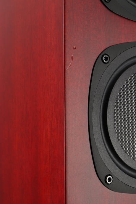 Close up of a used Quad S4 Floorstanding Speaker in a sapele mahogany finish showing small nicks on rear